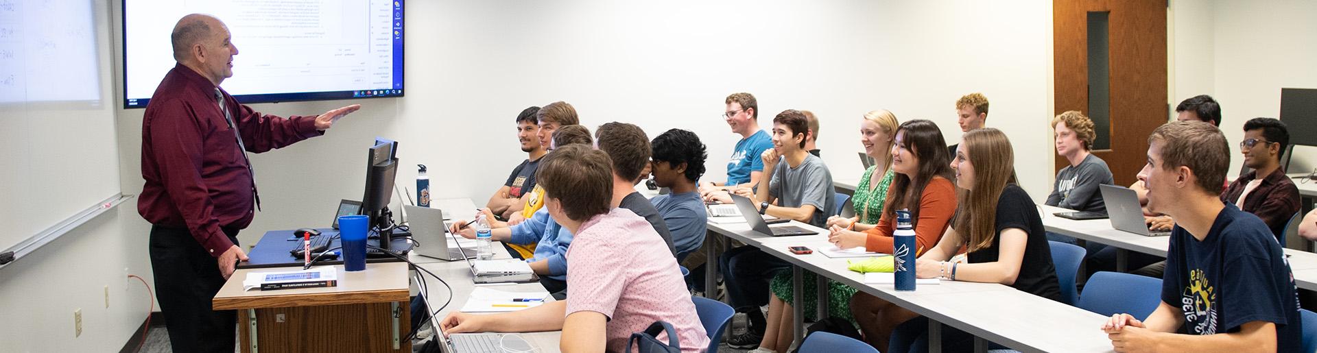 Dr. Gallagher teaching a Cyber Operations Class 1920