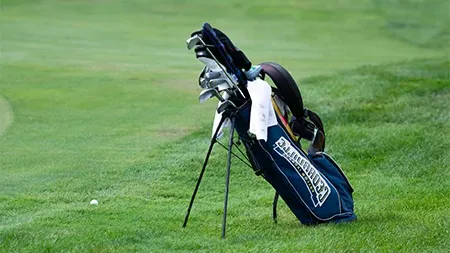 Cedarville golf bag on golf course.