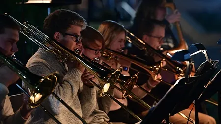 Group of musicians playing trombone in the Jazz Band